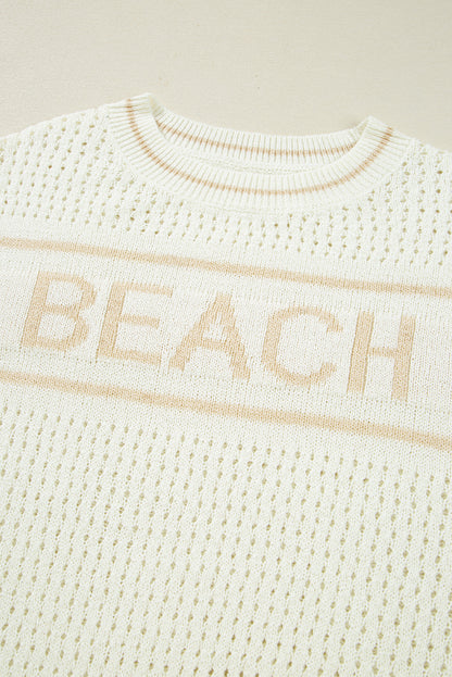white beach sweater