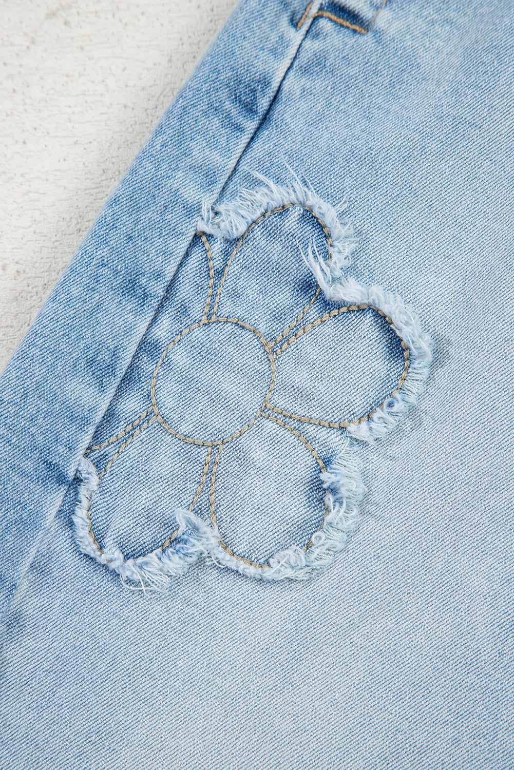 flower patched jeans