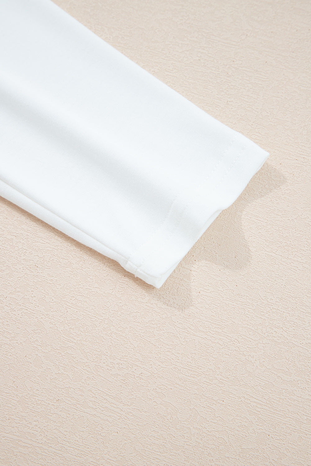 white long sleeve top