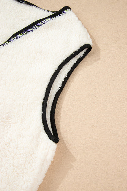 white sherpa vest