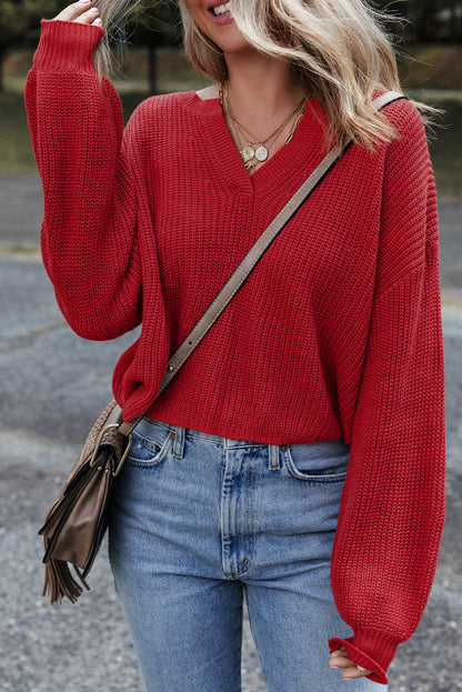 red v neck sweater