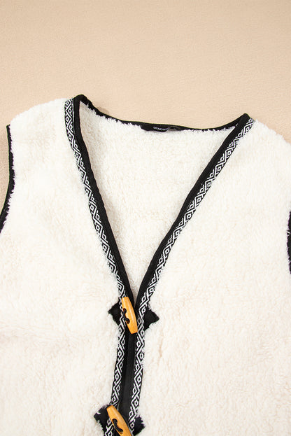 white sherpa vest