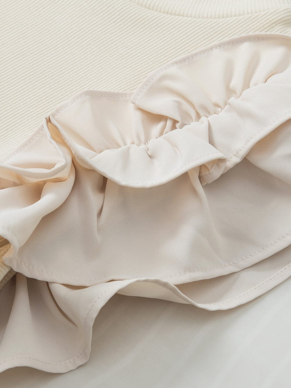Elegant Beige Ribbed Blouse with Ruffle Flutter Sleeves
