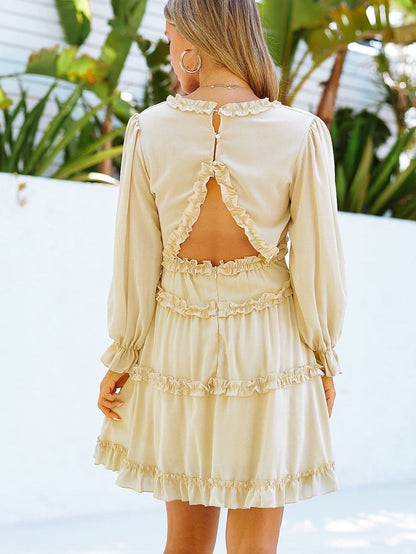 Elegant Beige Sheath Dress with V Neck Ruffle Detail and Open Back