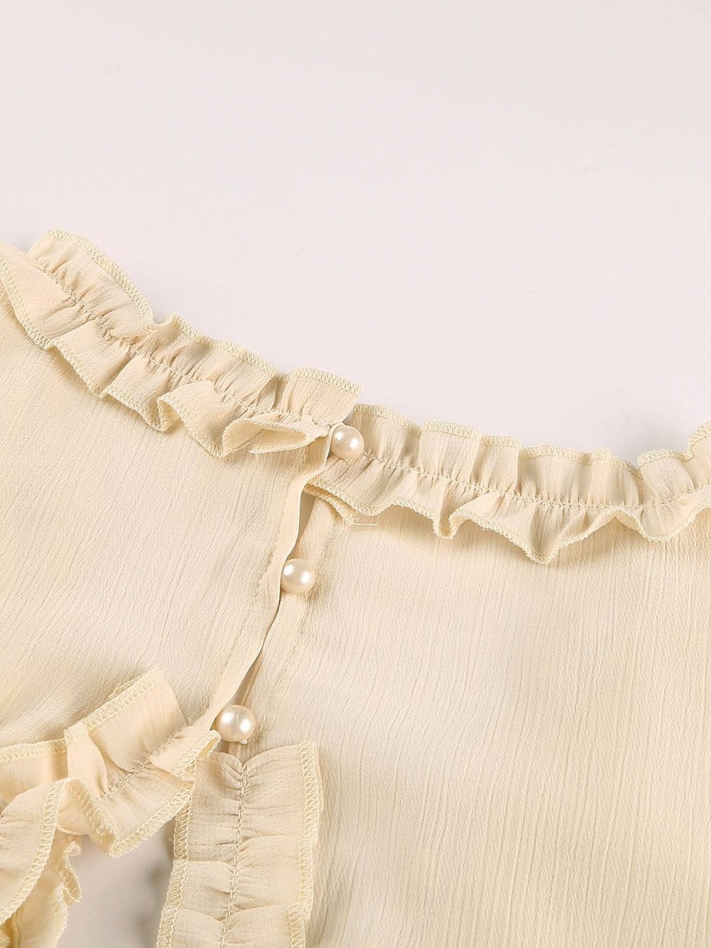 Elegant Beige Sheath Dress with V Neck Ruffle Detail and Open Back