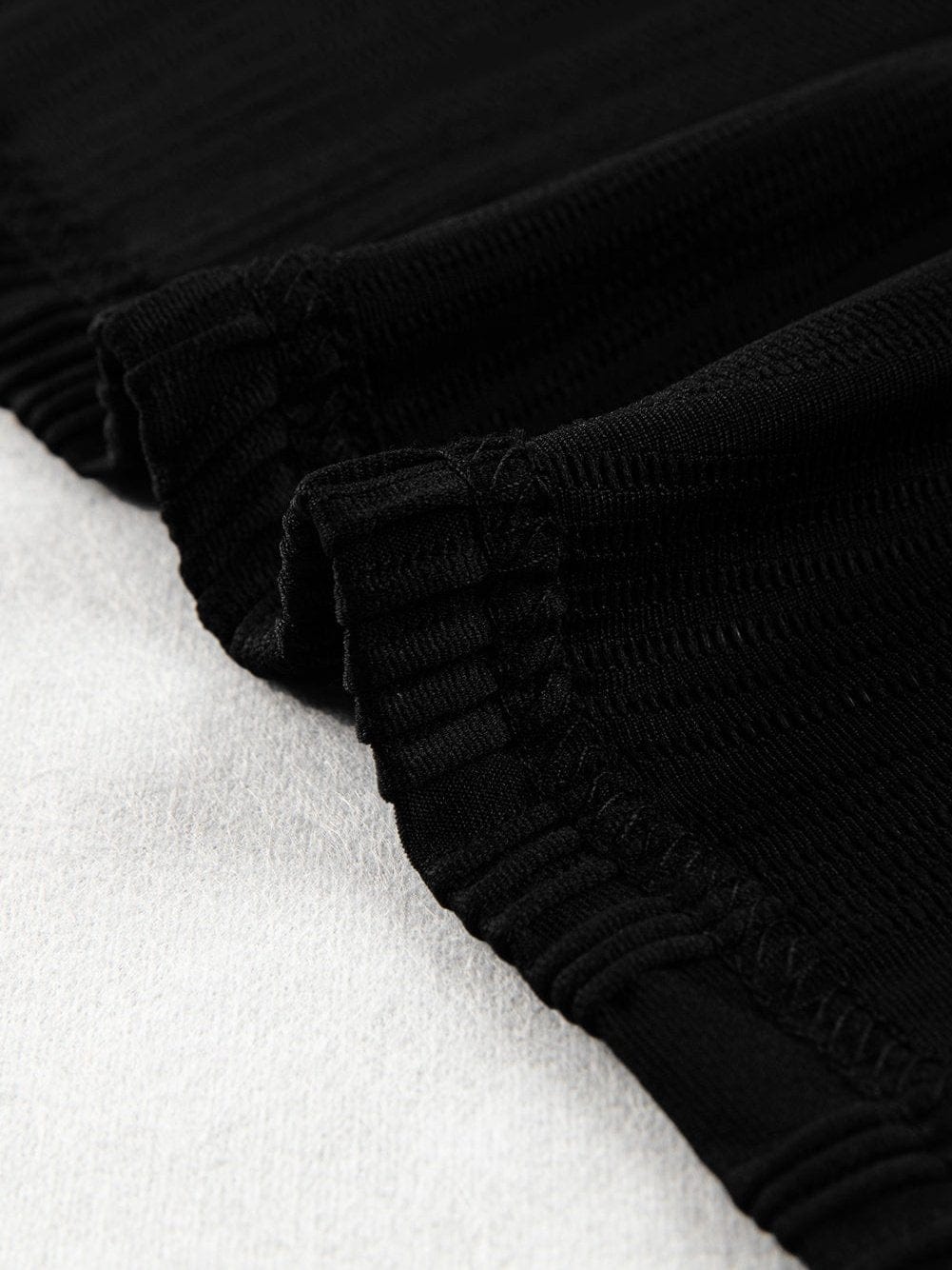 Elegant Black Cap Sleeve Textured Top with Wavy Design