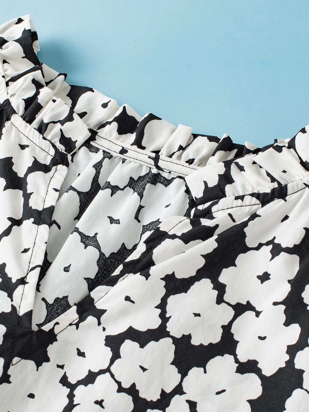 Elegant Black Floral Ruffle Sleeve Blouse with Ric Rac Detail