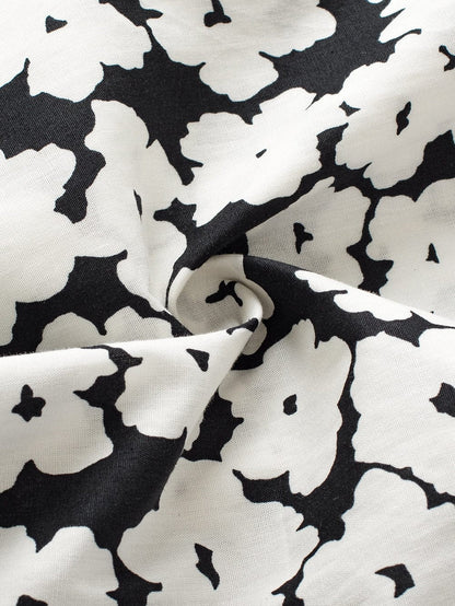 Elegant Black Floral Ruffle Sleeve Blouse with Ric Rac Detail