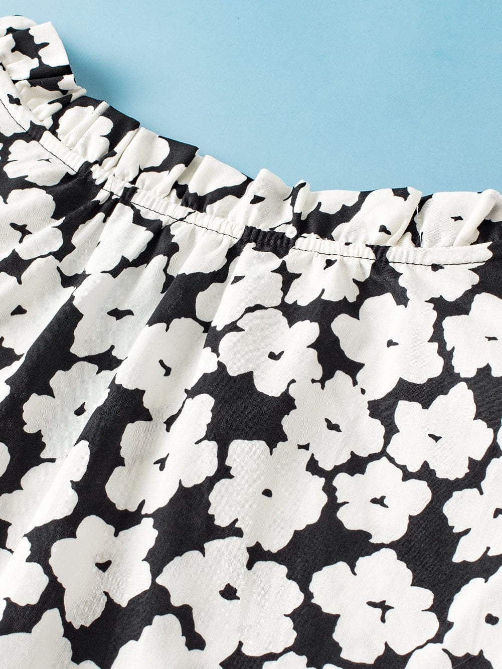 Elegant Black Floral Ruffle Sleeve Blouse with Ric Rac Detail