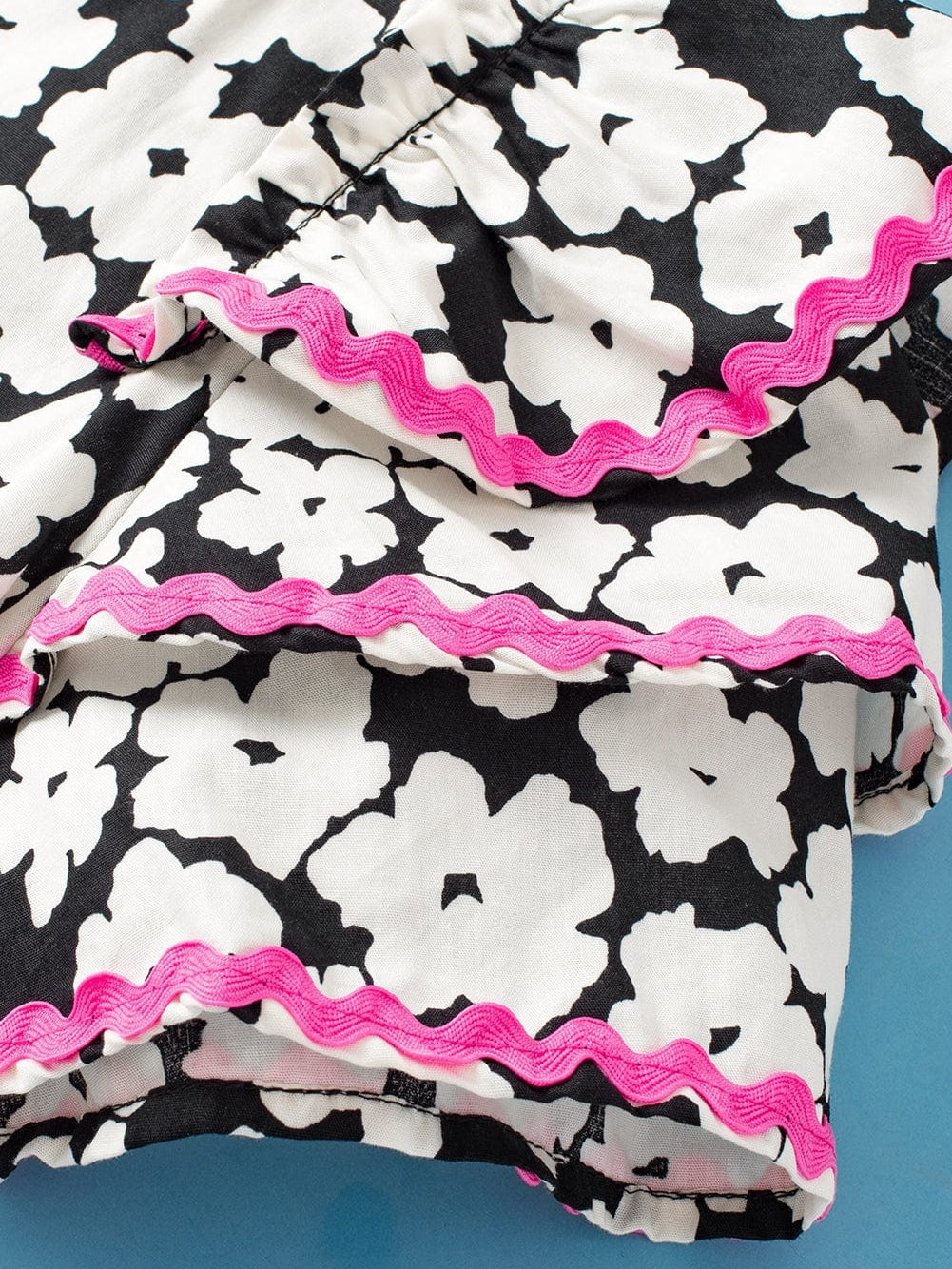 Elegant Black Floral Ruffle Sleeve Blouse with Ric Rac Detail