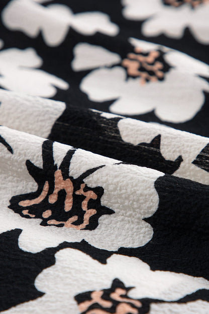 Elegant Black Floral Smocked Mini Dress with Puff Sleeves