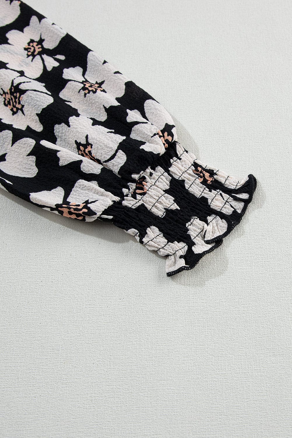 Elegant Black Floral Smocked Mini Dress with Puff Sleeves