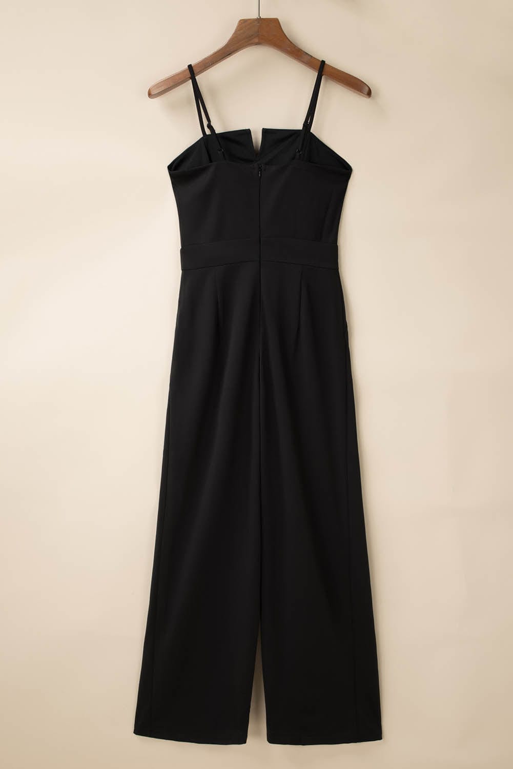 Elegant Black Jumpsuit with Slit Leg and Pocket Detail