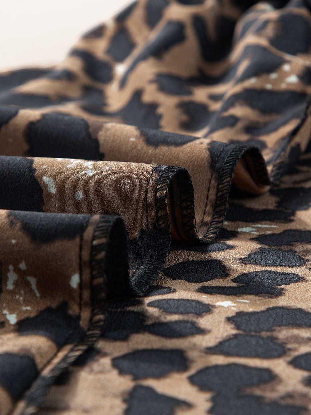 Elegant Black Leopard Print Flare Dress with Flutter Sleeves