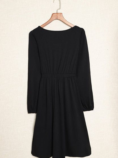 Elegant Black Long Sleeve Dress with Button Detail