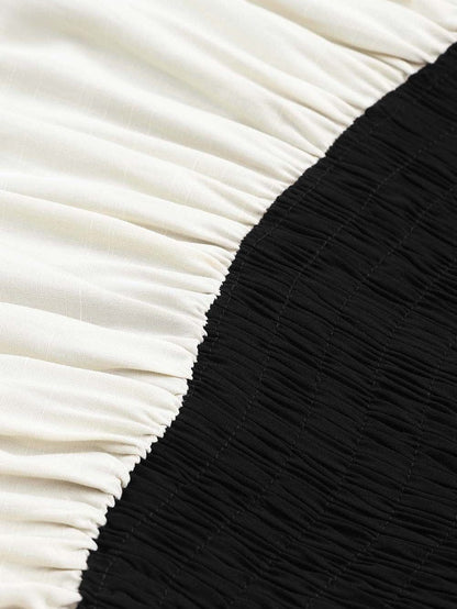 Elegant Black Patchwork Smocked Mini Dress with Color Block Detail