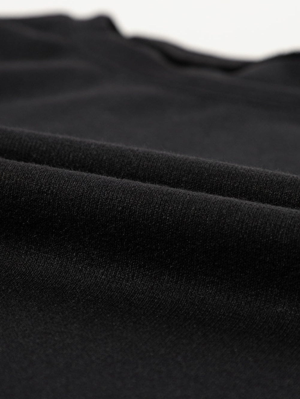 Elegant Black Pearl Embellished Crew Neck Tee