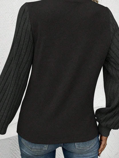 Elegant Black Ribbed Bishop Sleeve Knit Top