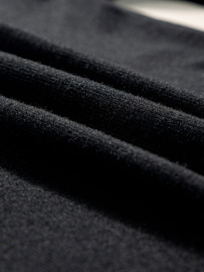 Elegant Black Ribbed V Neck Blouse with Puff Sleeves and Button Detail