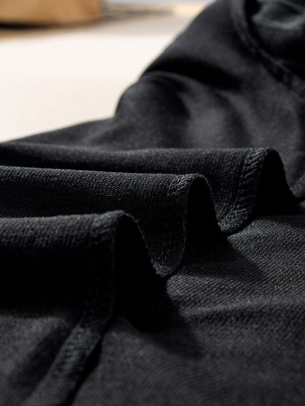 Elegant Black Ribbed V Neck Blouse with Puff Sleeves and Button Detail