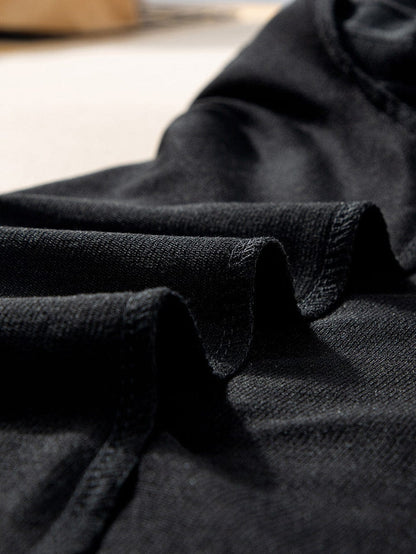 Elegant Black Ribbed V Neck Blouse with Puff Sleeves and Button Detail