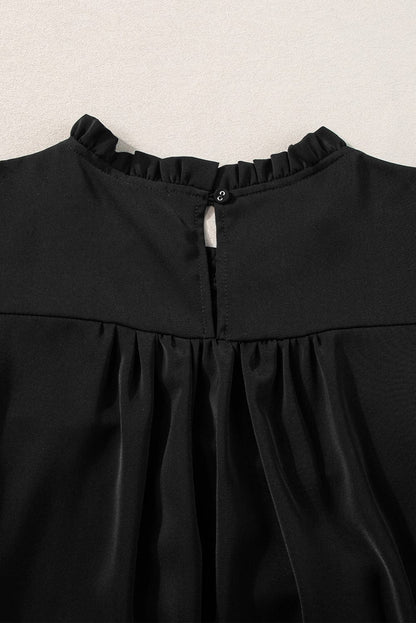 Elegant Black Smocked Blouse with Ruffle Sleeves