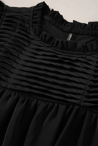 Elegant Black Smocked Blouse with Ruffle Sleeves