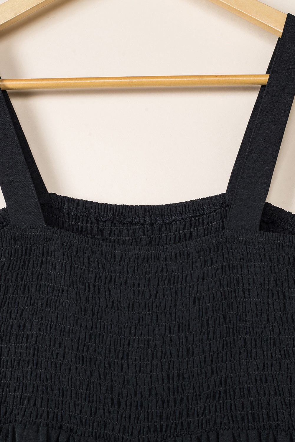 Elegant Black Smocked Sleeveless Jumpsuit with Wide Leg and Chic Details