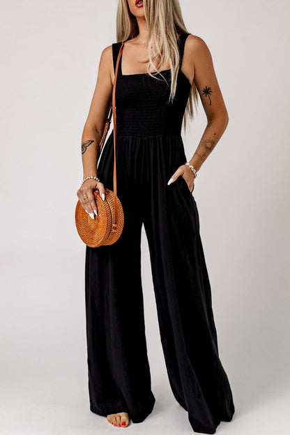 Elegant Black Smocked Sleeveless Jumpsuit with Wide Leg and Chic Details