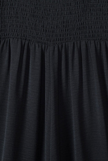 Elegant Black Smocked Sleeveless Jumpsuit with Wide Leg and Chic Details