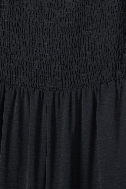 Elegant Black Smocked Sleeveless Jumpsuit with Wide Leg and Chic Details