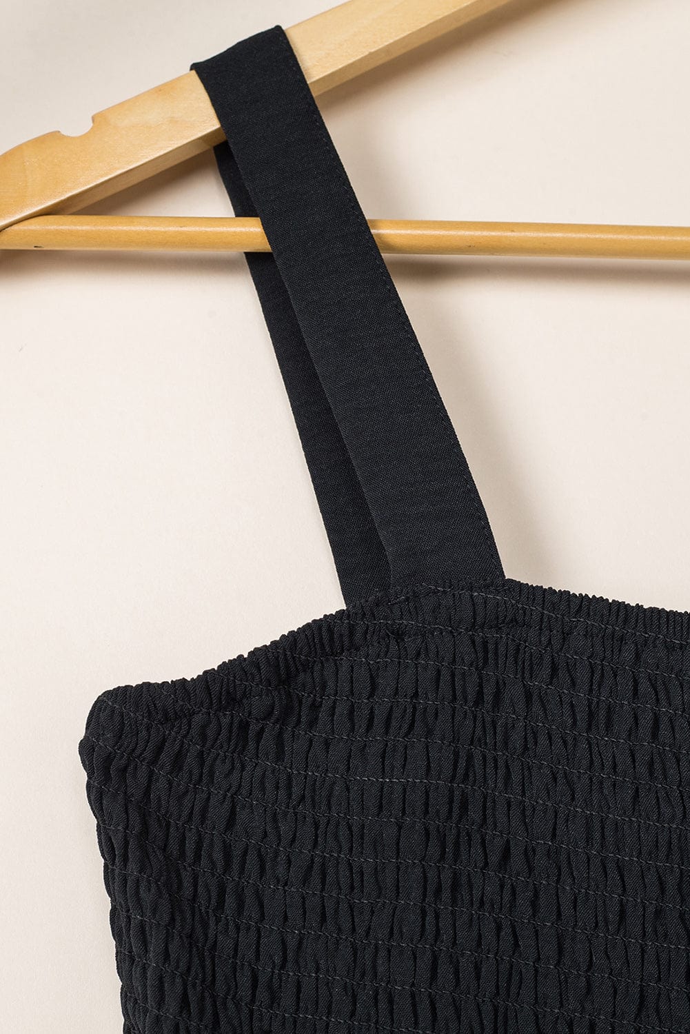 Elegant Black Smocked Sleeveless Jumpsuit with Wide Leg and Chic Details