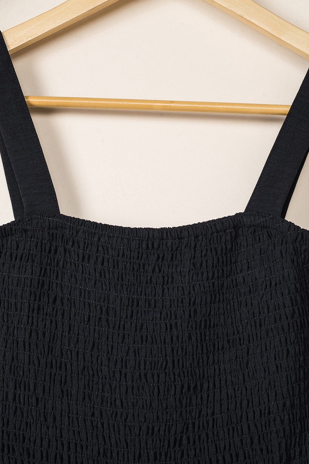 Elegant Black Smocked Sleeveless Jumpsuit with Wide Leg and Chic Details