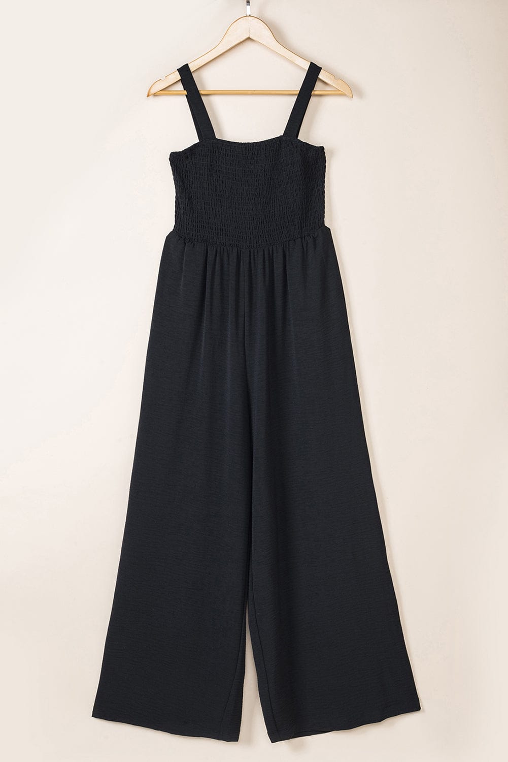 Elegant Black Smocked Sleeveless Jumpsuit with Wide Leg and Chic Details