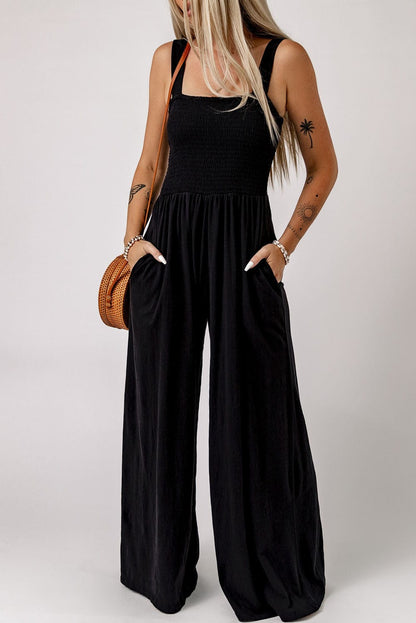 Elegant Black Smocked Sleeveless Jumpsuit with Wide Leg and Chic Details