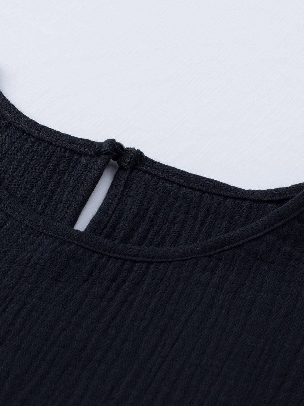 Elegant Black Tiered Ruffle Textured Blouse with Short Sleeves