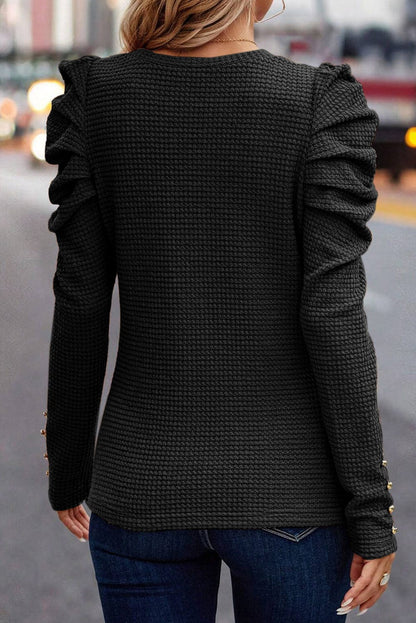 Elegant Black Waffle Knit Gigot Sleeve Top with Buttoned Cuffs