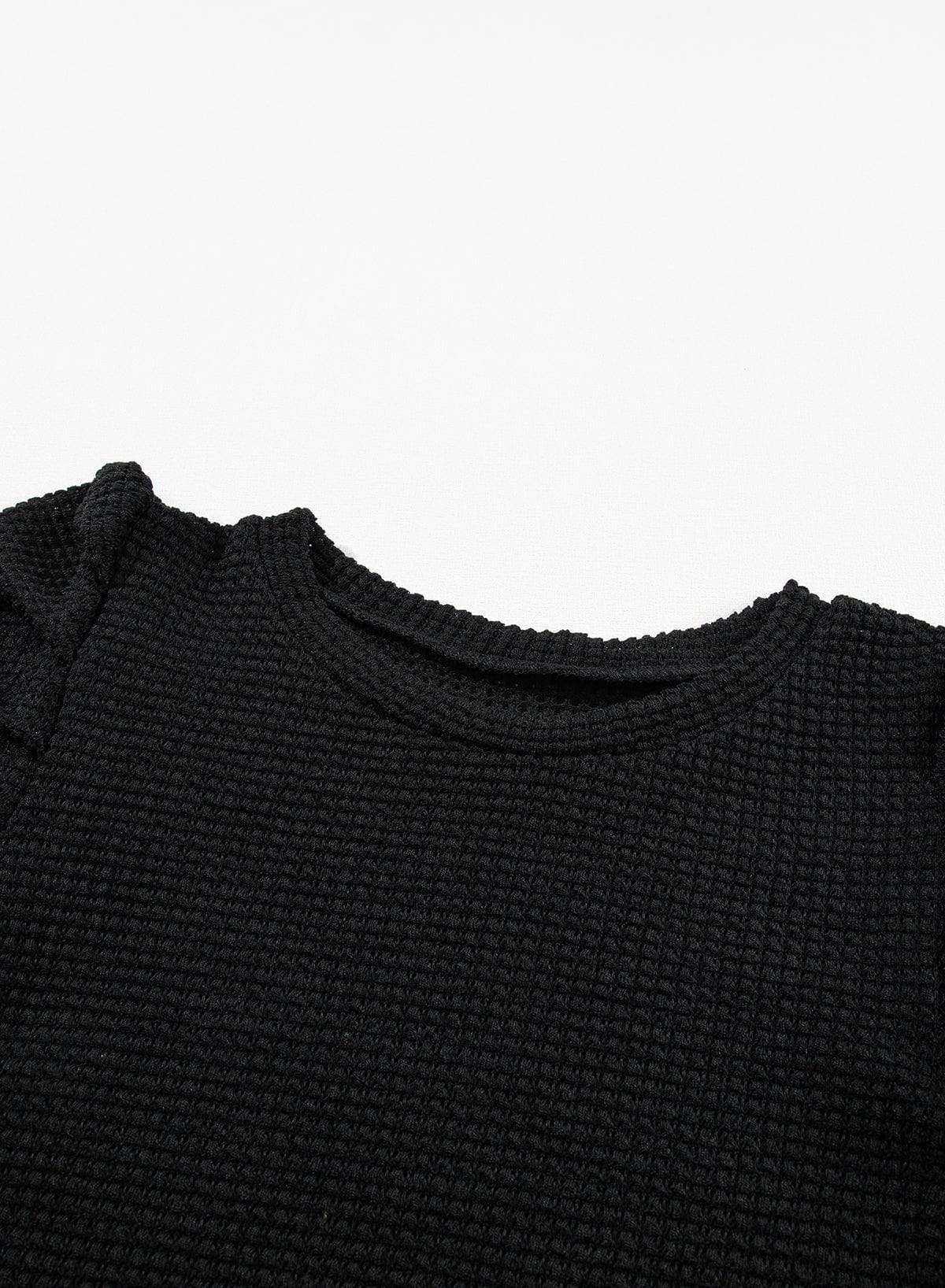 Elegant Black Waffle Knit Gigot Sleeve Top with Buttoned Cuffs