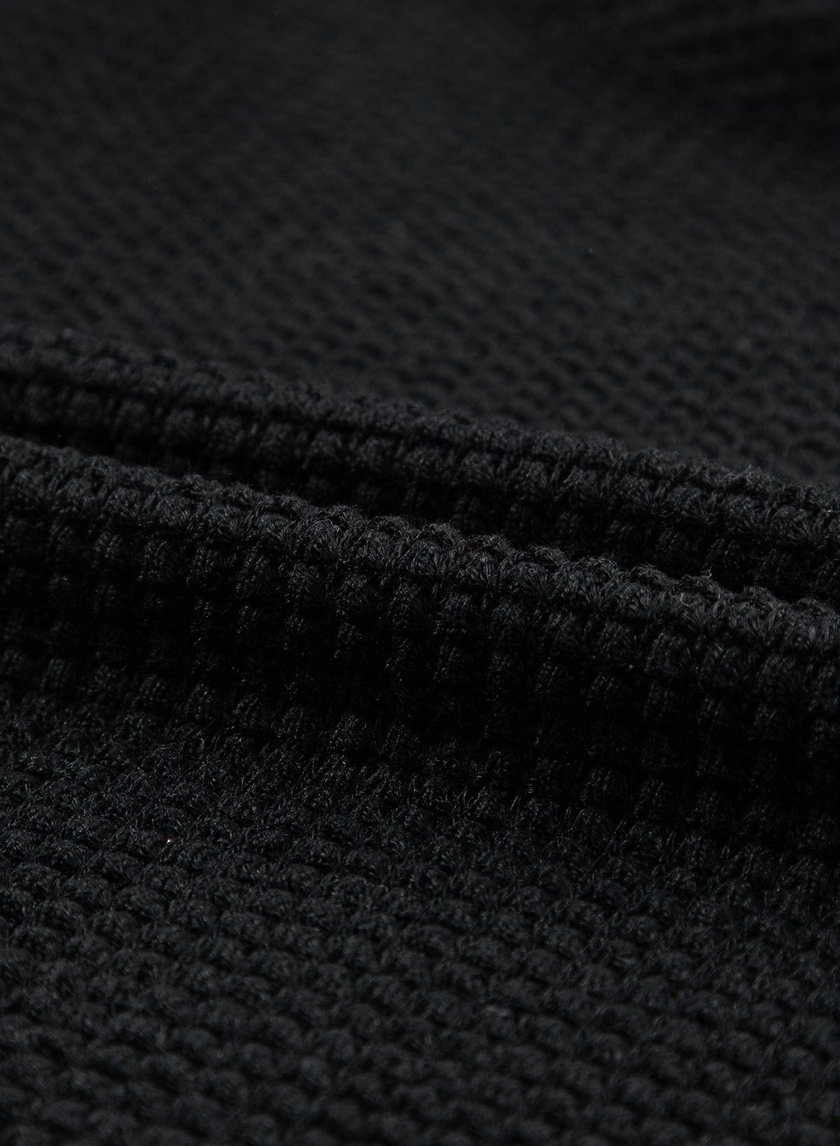 Elegant Black Waffle Knit Gigot Sleeve Top with Buttoned Cuffs