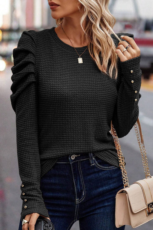Elegant Black Waffle Knit Gigot Sleeve Top with Buttoned Cuffs