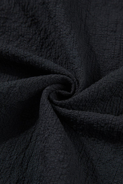 Elegant Black Waffle Knit Ruffle Flutter Top with Notch Neck