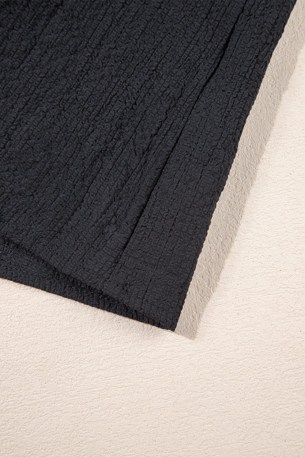 Elegant Black Waffle Knit Ruffle Flutter Top with Notch Neck