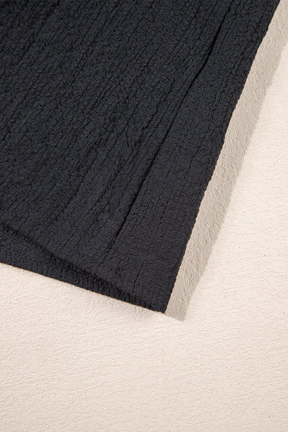 Elegant Black Waffle Knit Ruffle Flutter Top with Notch Neck