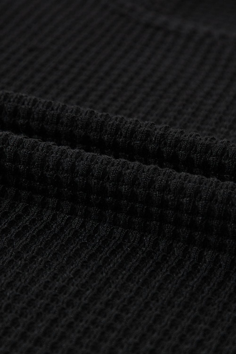 Elegant Black Waffle Knit Top with Ruched Puff Sleeves