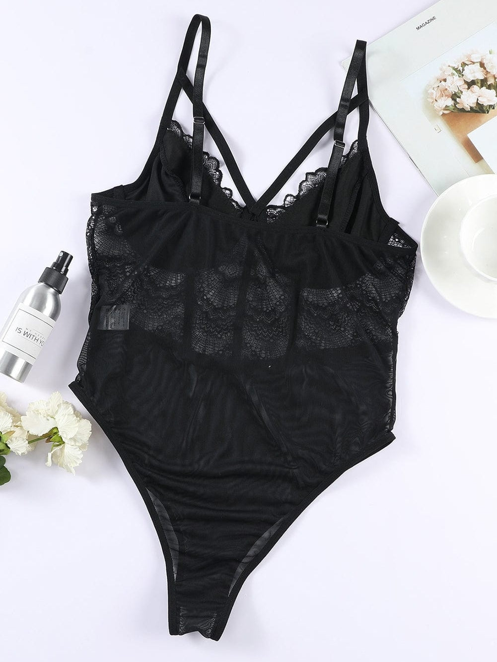 Elegant Floral Lace Bodysuit with V-Neck and Strappy Design