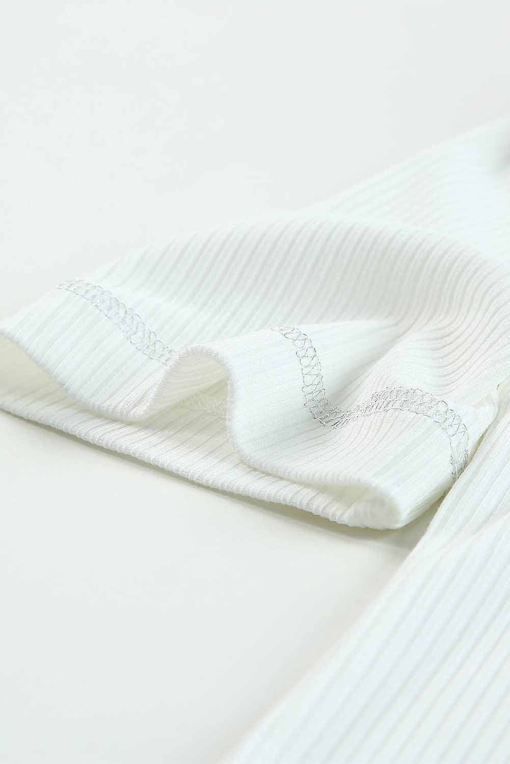 Elegant Ivory Ribbed Knit Top with Puff Sleeves