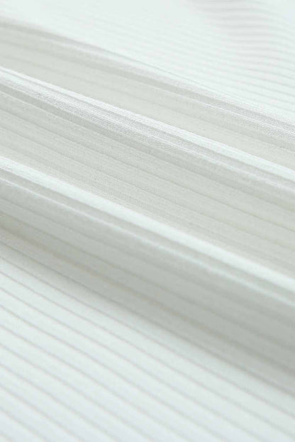 Elegant Ivory Ribbed Knit Top with Puff Sleeves