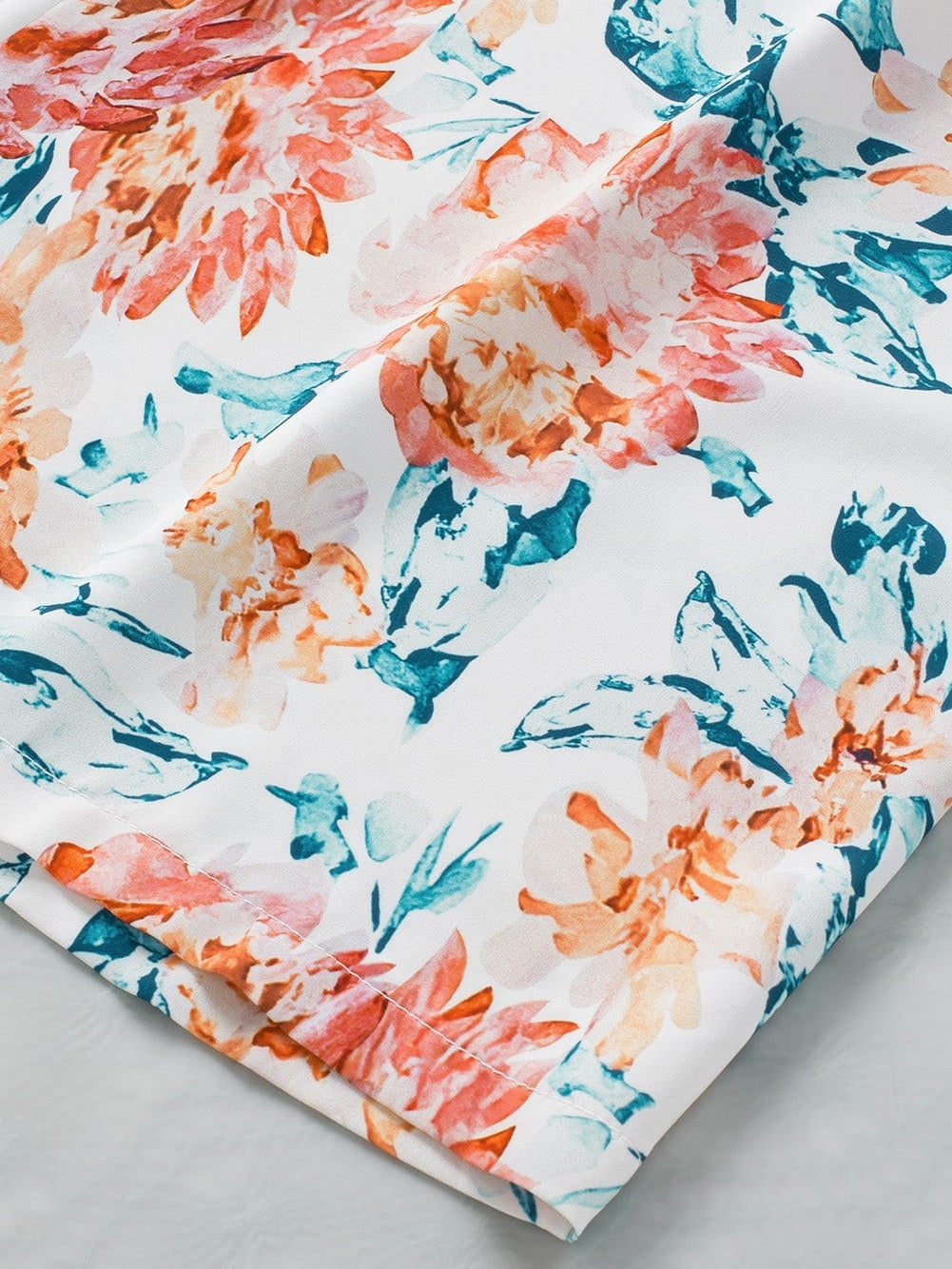 Elegant Orange Floral Wide Leg Jumpsuit with Spaghetti Straps