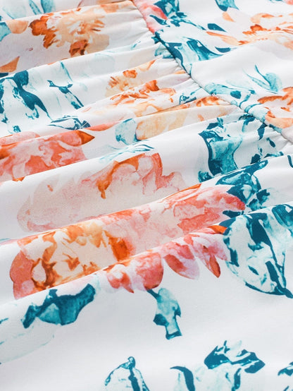 Elegant Orange Floral Wide Leg Jumpsuit with Spaghetti Straps