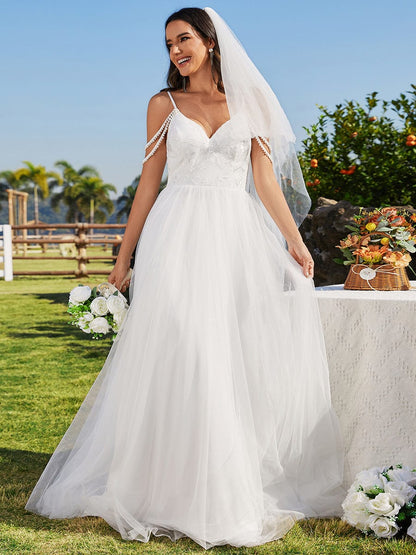 Elegant Pearl Embroidered Wedding Gown with Spaghetti Straps